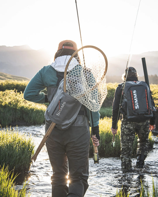 Simms Fishing Dry Creek Z Sling Pack, worn