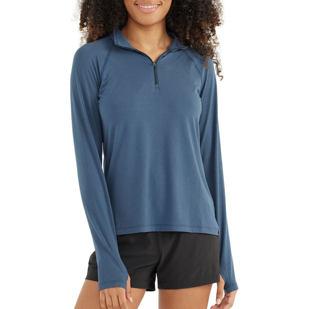 Free Fly Women's Bamboo Flex Quarter Zip, True Navy, angled view